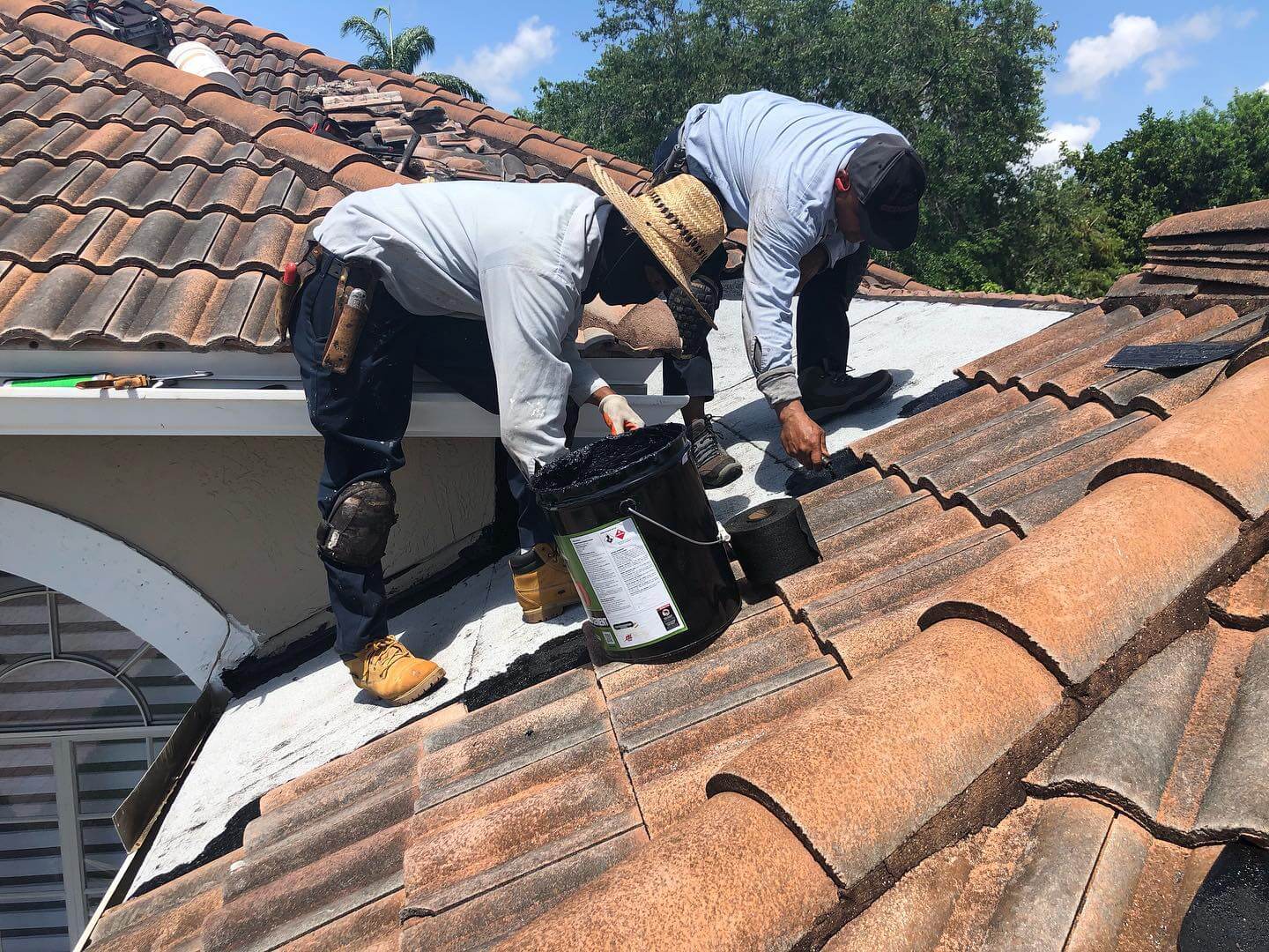 Roofers working | Roofing Concepts Unlimited